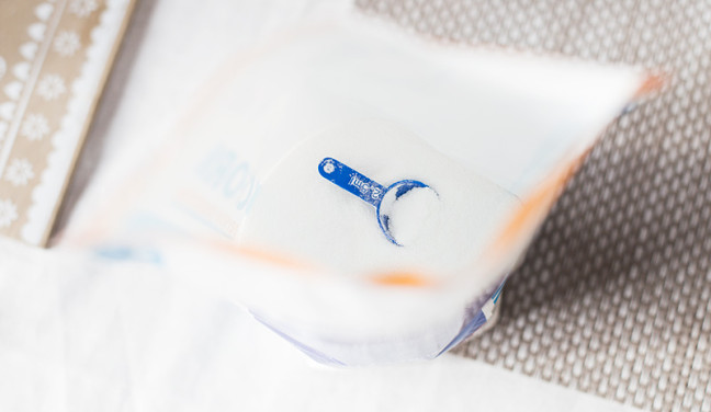 Photo shows an open bag of D-ribose. You can see a small measuring scoop sitting in the white powder supplement.