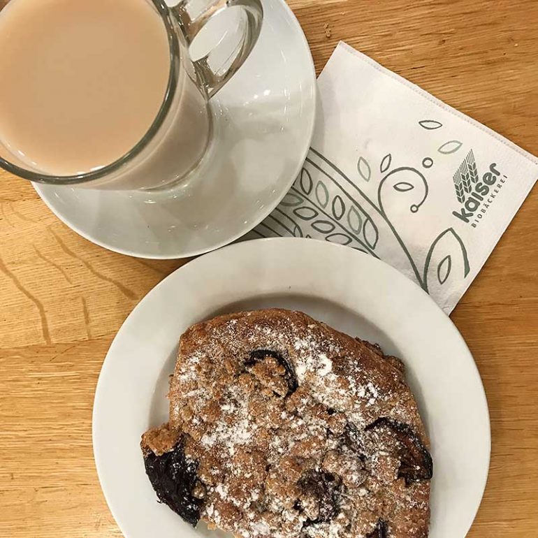 Tea with soya milk and a vegan plum pastry