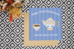 Celebrate 20 years married with this colourful and bold card with a pretty floral china tea set. The card has a green striped background and the card reads Happy China Anniversary twen tea years married