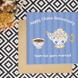Celebrate 20 years married with this colourful and bold card with a pretty floral china tea set. The card has a green striped background and the card reads Happy China Anniversary twen tea years married
